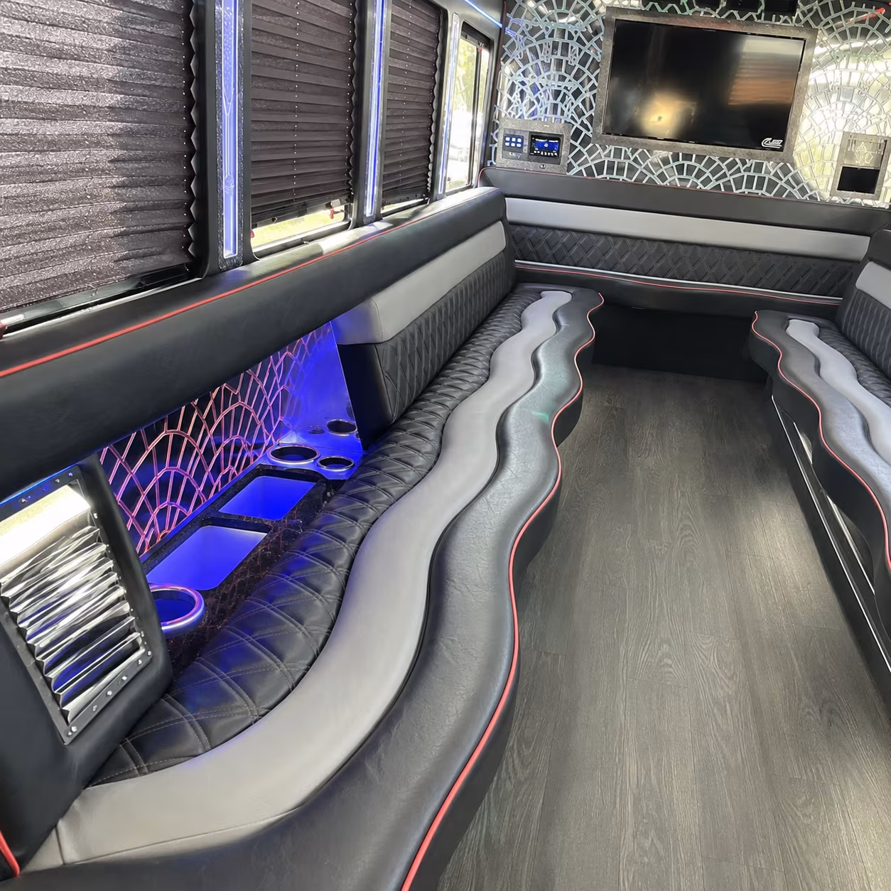 Passenger seating aboard a party bus rental serving Providence